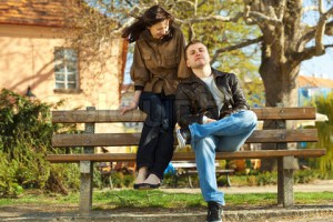 love couple sitting on a bench